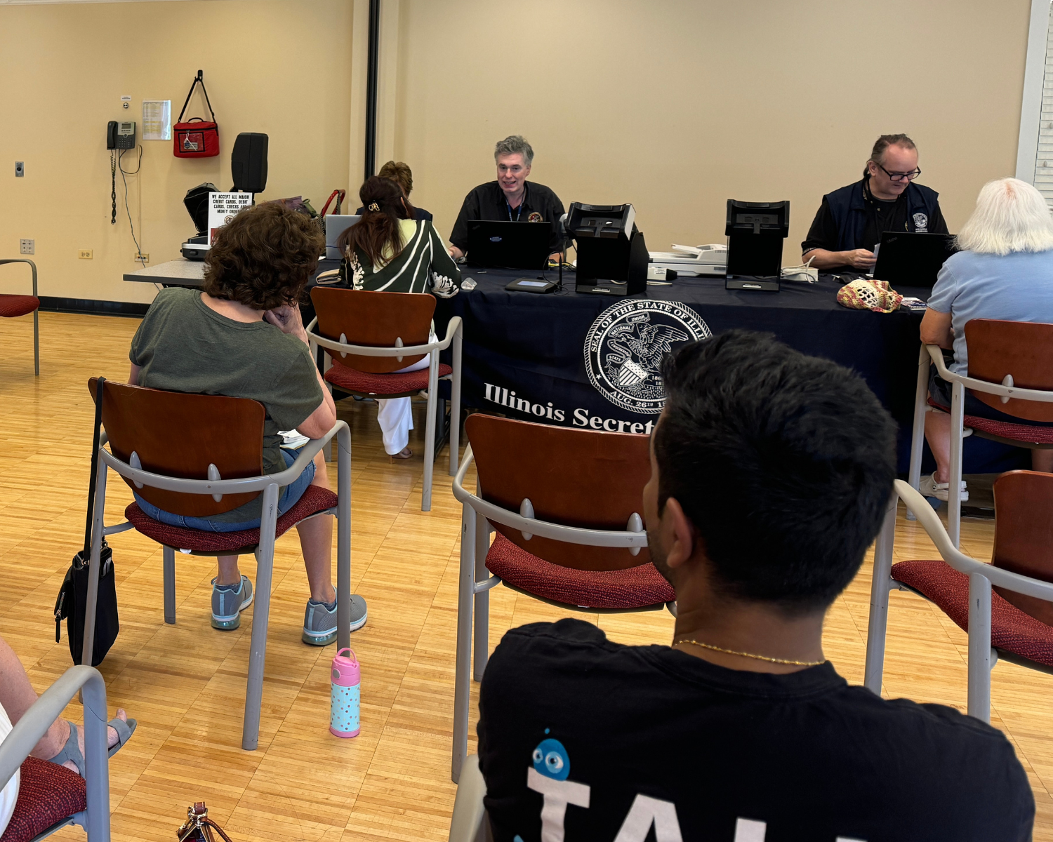 People sitting and waiting in a room